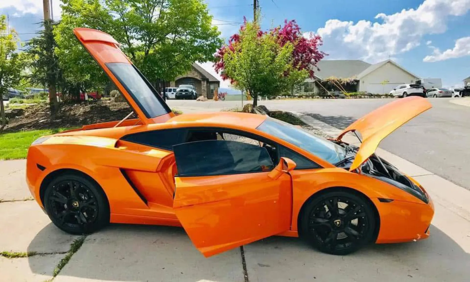 Orange Lamborghini Gallardo being detailed